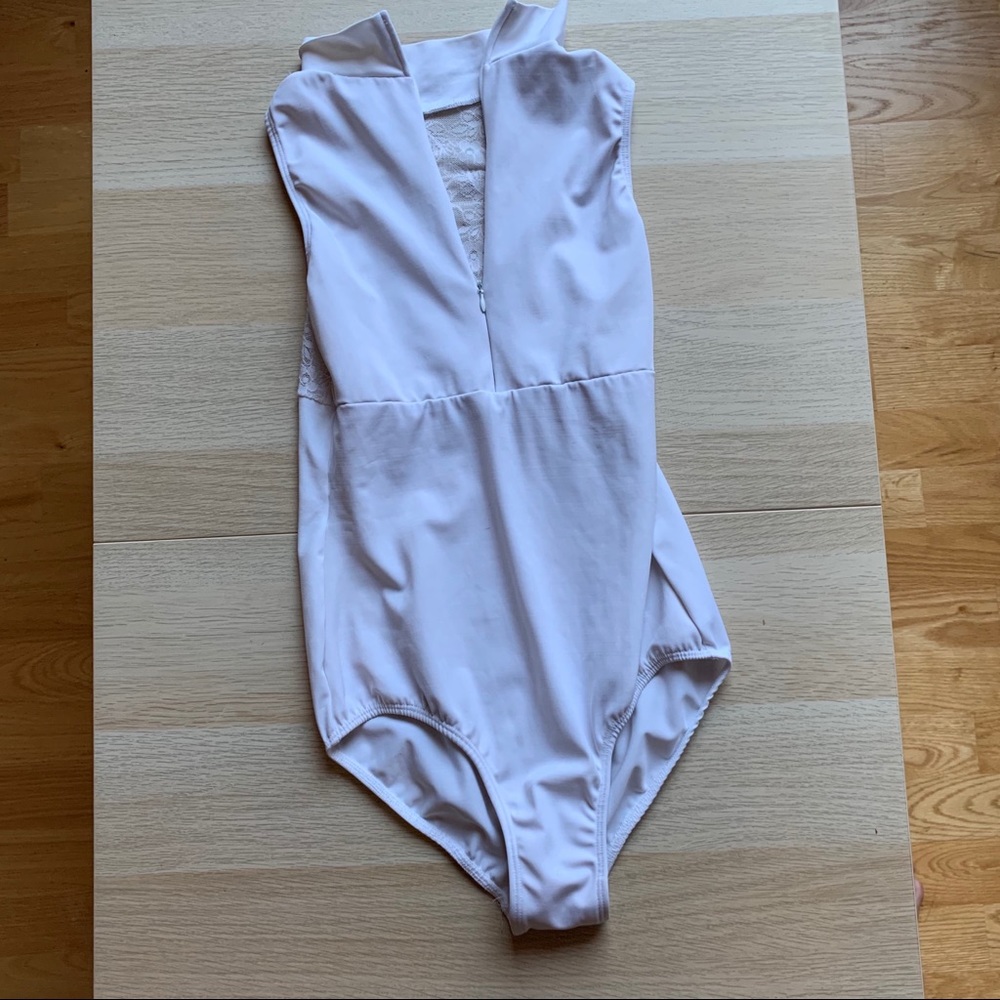 White class in leotard